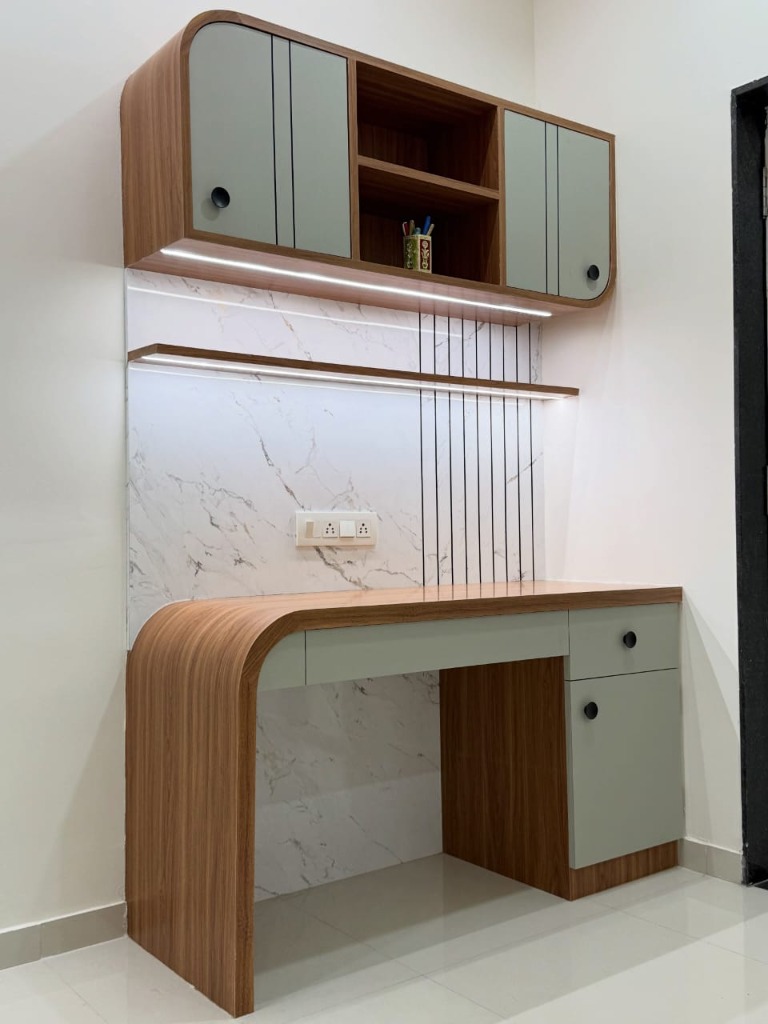Custom waterfall edge study desk with overhead storage cabinets by Sharma Furniture